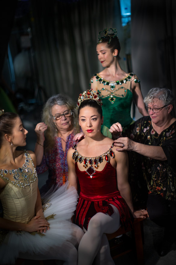 Dancers Benedicte Bemet (left), Jill Ogai (in red) and Sharni Spencer (in green) with volunteers Naomi Otton and Marsia Bergh.