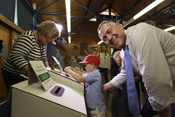 Joe Hockey voting at Lane Cove Public School during the 2013 election.
