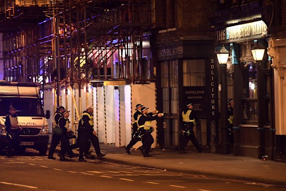 Armed police raid The Blue Eyed Maid in Borough high street at London Bridg