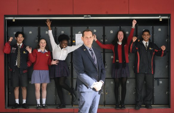  Reservoir High School senior students (left ro right) Andy Ngo, Hayley Corneille, Rumbi Mutezo,
Charlotte Reginato and Dhruv Verma, with 
principal Andrew McNeil.