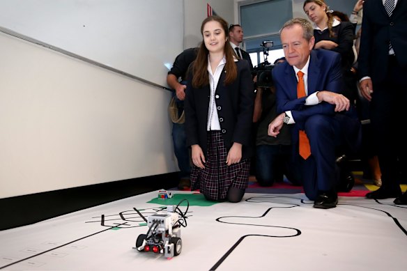 Opposition Leader Bill Shorten looks at 3D printing during his visit to Domremy Catholic College in Sydney.