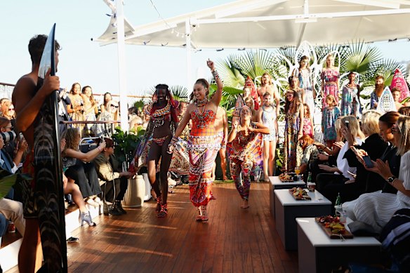 Designer Camilla Franks walks with models during the runway during the Camilla show at Mercedes-Benz Fashion Week Resort 17 Collections at The Seadeck on May 19, 2016 in Sydney, Australia.