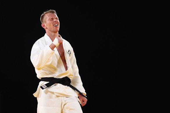 Nathan Katz of Team New Zealand celebrates during the Judo Men's 66kg Contest for Bronze medals .