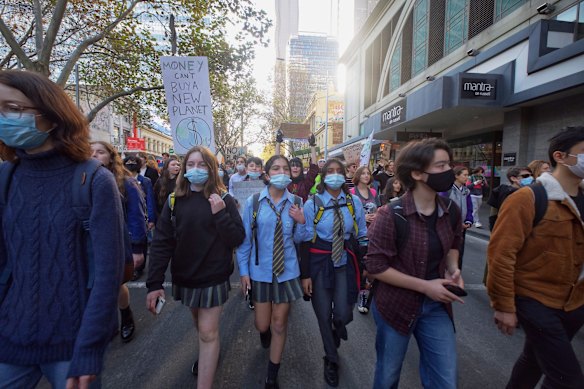 An estimated crowd of five thousand gathered at Treasury Gardens on Friday for Climate Strike, a rally and march organised by School Strike 4 Climate after the recent federal budget announcement. 