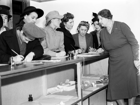 Recruits for the Australian Women’s Army fill in enrolment forms at the Sydney headquarters of the Women’s Voluntary National Register at the Bank of NSW on O’Connell Street, Sydney, on August  25, 1941. 