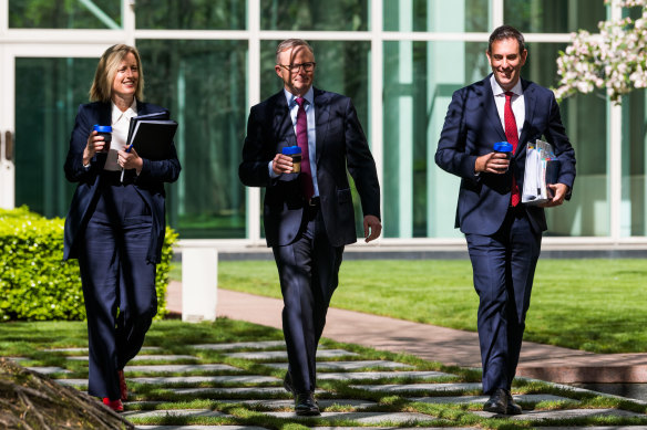 Finance Minister Katy Gallagher, Prime Minister Anthony Albanese and Treasurer Jim Chalmers in the senate courtyard at Parliament House on Tuesday.