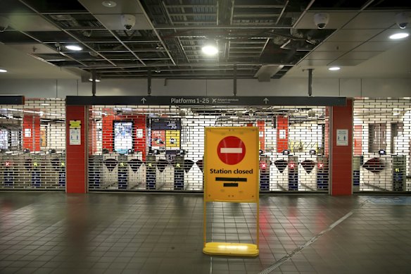 An empty, closed up concourse at Central Station on Monday.