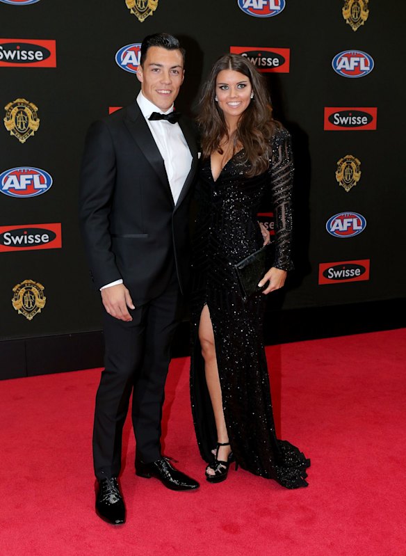 GWS footballer Dylan Shiel poses for a photo with his partner Georgia Williams   on the red carpet ahead of the 2015 AFL Brownlow Medal count at Crown Palladium.