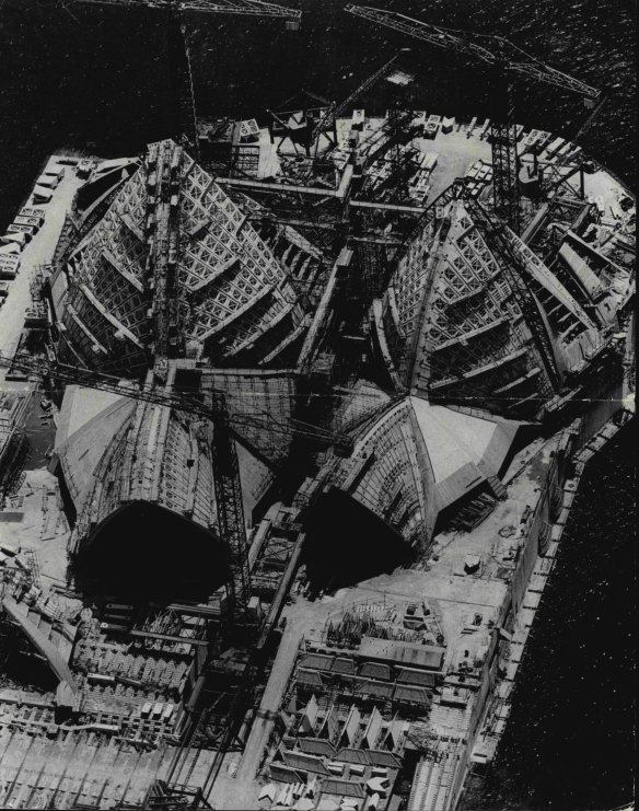 A bird’s eye view of the complex mass of machinery and materials on the Opera House site in 1965.