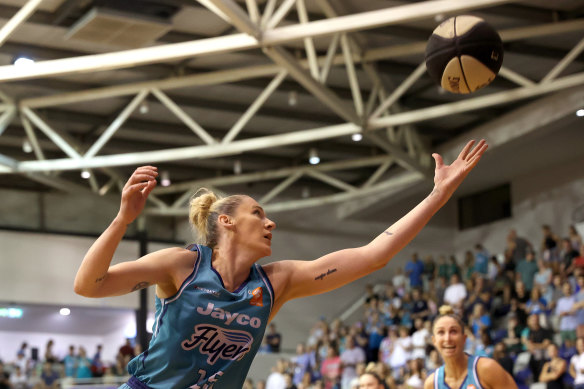 That’s mine: Lauren Jackson stretches for a rebound in Sunday’s championship clinching win over the Lynx.