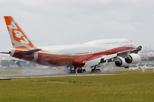 The new Boeing 747-8 Intercontinental jetliner lands at Le Bourget airport on the eve of the Paris Air Show.