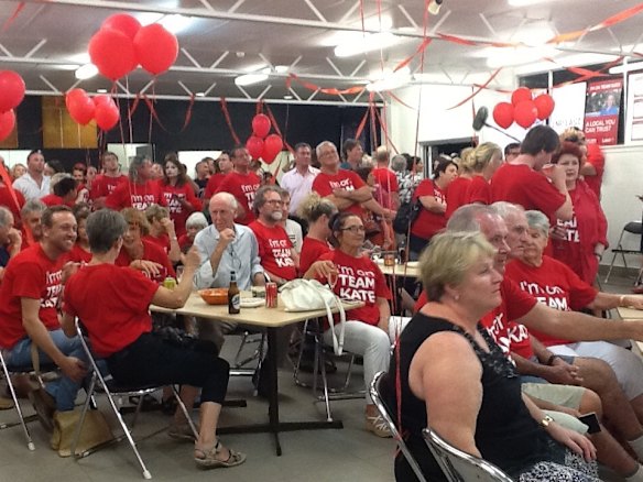 Supporters for Labor's Ashgrove candidate Kate Jones gather together on election night.