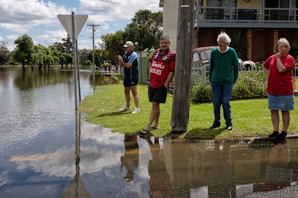 Locals watch the water rise, Friday November 4, 2022.