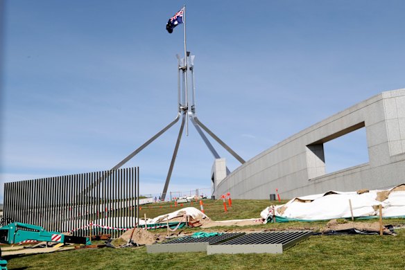 A security fence is installed across the lawns of Parliament House in Canberra on Tuesday 12 September 2017. 