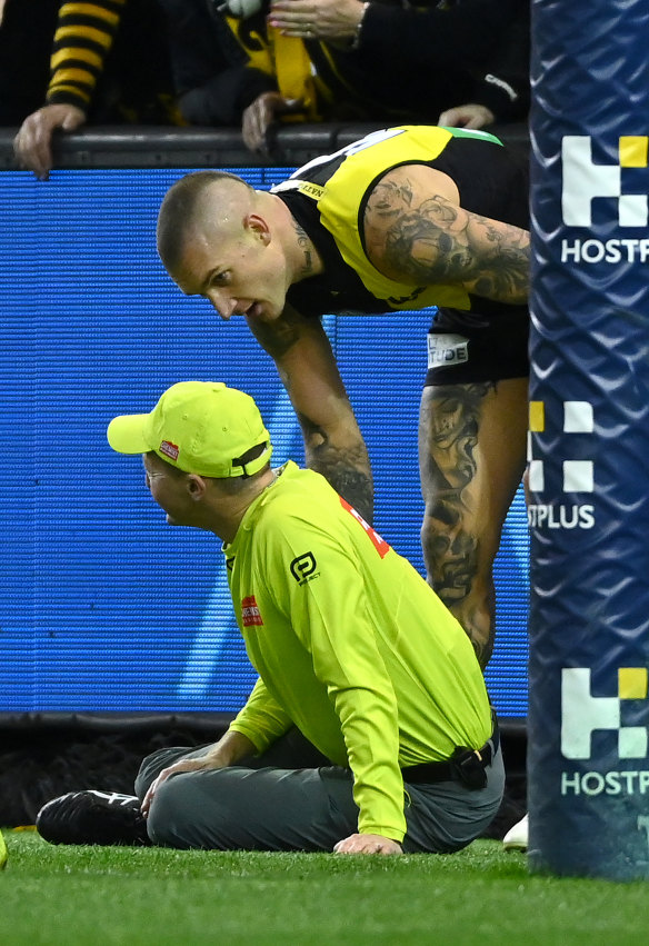 Flashback: Dustin Martin checks on the goal umpire.