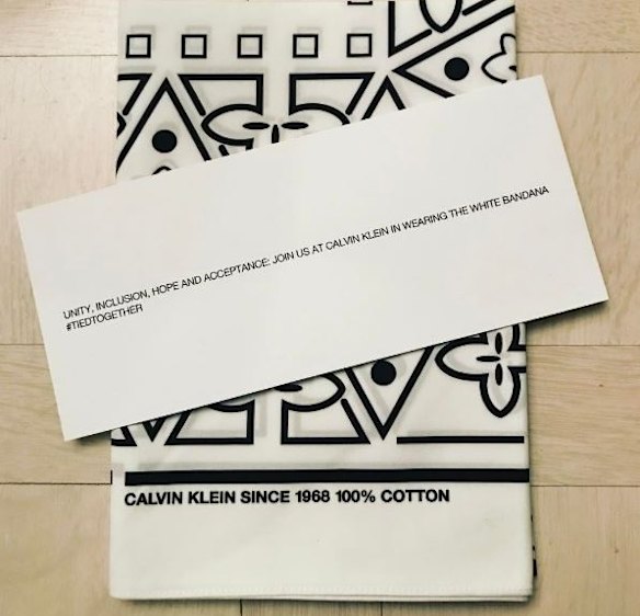 Calvin Klein also sent white bandannas to all their attendees to wear at their runway in celebration of unity, inclusion, hope and acceptance.