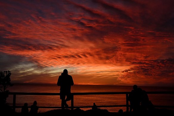 A red sunrise at Avalon ahead of a warm weekend.