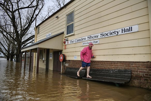 Water continues to rise, inundating the Camden Show Society Hall and The Camden Sports club.