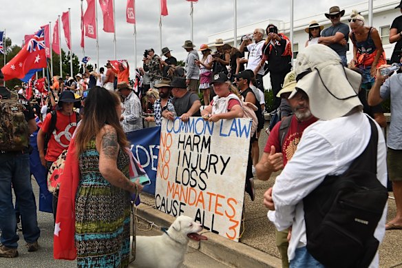 Crowds at the Convoy protesters carried placards to protest against COVID restrictions and vaccine mandates.