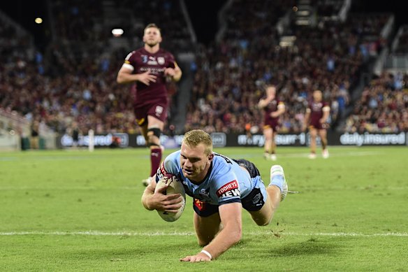 Tom Trbojevic of the Blues scores a try during game one of the 2021 State of Origin series.