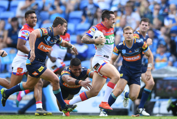 Clear air: Mitchell Pearce found some room but the Titans were far too good.