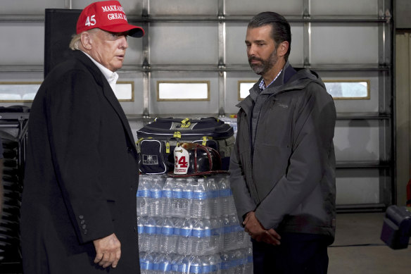 Donald Trump visits the East Palestine Fire Department with his son, Donald Trump Jr in 2023.