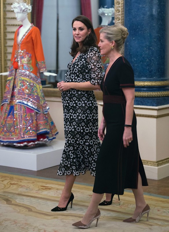 Britain's Kate The Duchess of Cambridge and The Countess of Wessex, right, host a reception at Buckingham Palace on behalf of The Queen, during London Fashion Week to celebrate and showcase a new creative initiative entitled the Commonwealth Fashion Exchange.