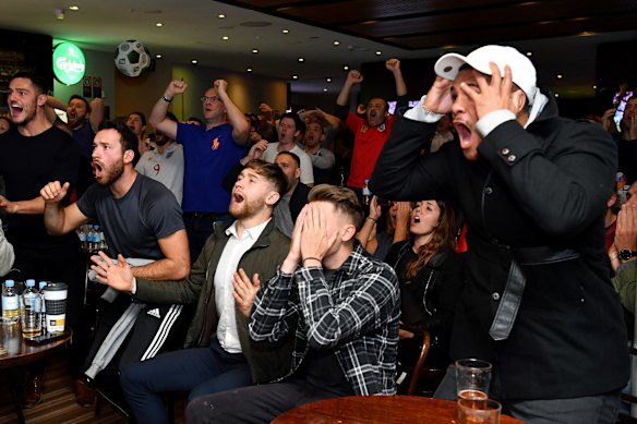 England supporters watch the FIFA World Cup semi-final between Croatia and England in Coogee, Sydney.
