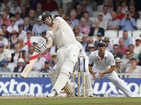 Steve Smith hits a six to reach his century.