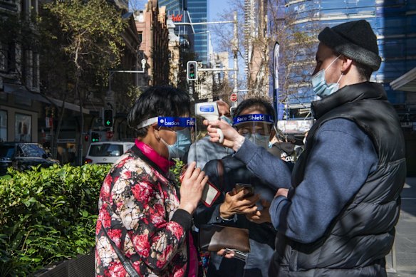 People queuing for a COVID-19 vaccination at the CBD Vaccination Hub, Pitt Street.