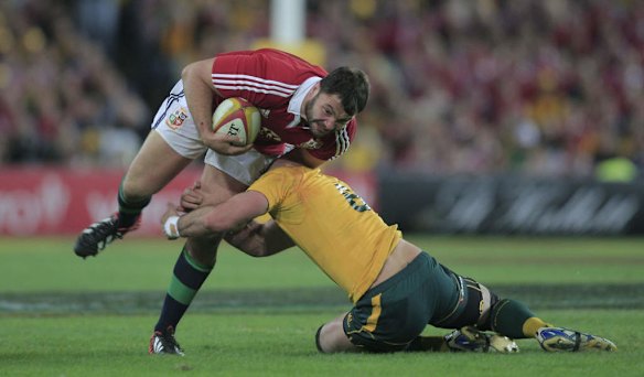 The Lions Alex Carbisiero tries to break through Wallabies defence.