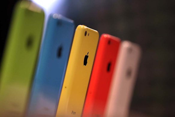 The iPhone 5C in green, blue, yellow, pink and white.
