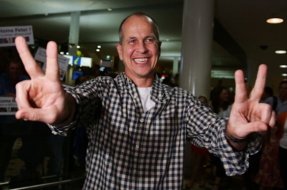 Greste with his mother Lois and father Juris.