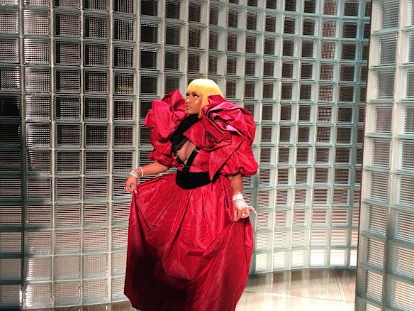 Rapper Nicki Minaj poses upon arriving at the Marc Jacobs fashion show.