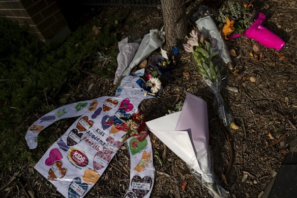 A shrine outside Anglicare Newmarch House. Anglicare has appointed an independent adviser to oversee its management of the deadly coronavirus outbreak at Newmarch House nursing home in western Sydney, where 16 elderly residents have died and 69 people have been infected – including another three staff members picked up by screening on Wednesday.Anglicare has appointed an independent adviser to oversee its management of the deadly coronavirus outbreak at Newmarch House nursing home in western Sydney, where 16 elderly residents have died and 69 people have been infected – including another three staff members picked up by screening on Wednesday. The appointment of Andrew Kinkade was announced late on Thursday after the Aged Care Quality and Safety Commission gave Anglicare 24 hours to agree to terms, including the appointment, or face having its licence to operate Newmarch House revoked.


