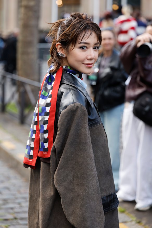 Hong Kong actress Elva Ni outside the Miu Miu show at Paris Fashion Week.