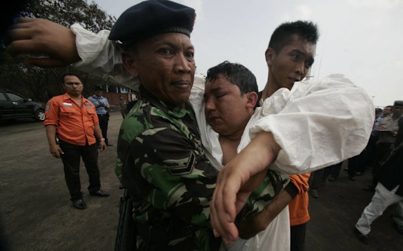 Immigrant survivor at Merak port.