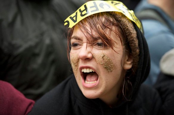 One of the protesters shows her rage.
