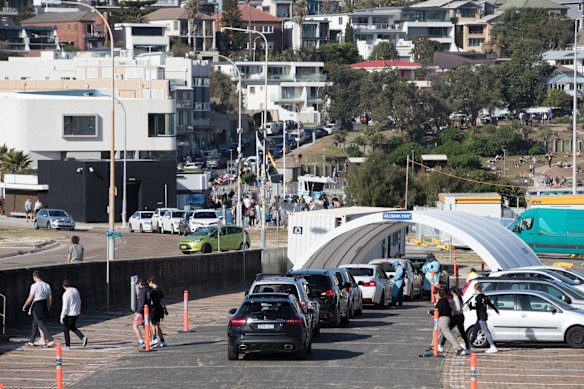 A very busy day at Bondi, with the drive through testing clinic right next door. 