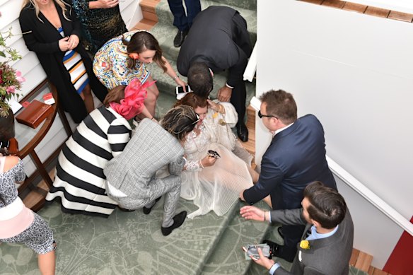 Gina Rinehart took a spill down a flight of stairs in the Emirates marquee.