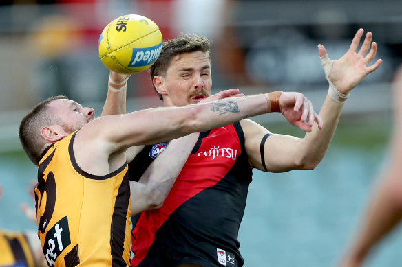 Happy times: Joe Daniher gets physical in his comeback game.