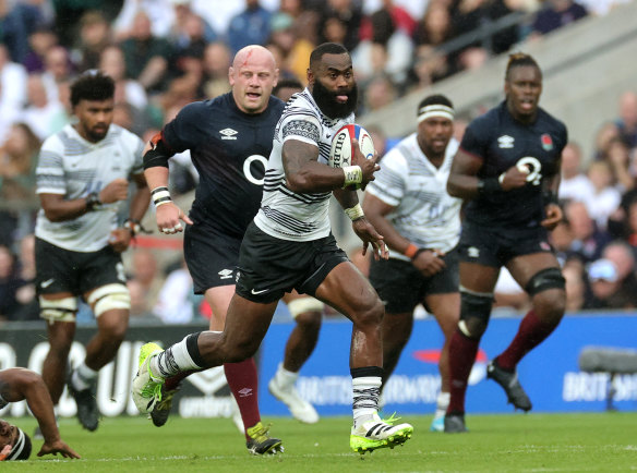 Semi Radradra of Fiji breaks with the ball against England at Twickenham.