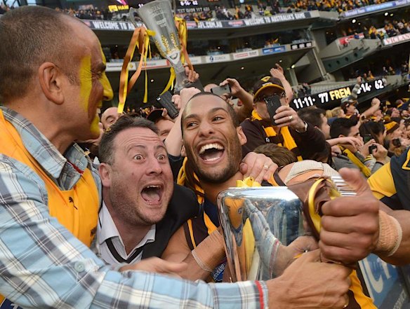 Josh Gibson celebrates with Hawthorn fans.