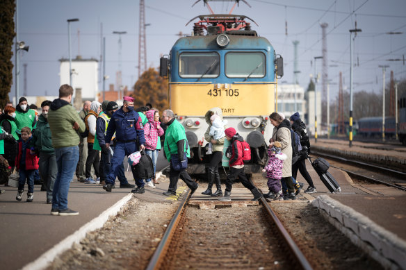 Refugees arrive at the Hungarian border town of Zahony on a train that has come from Ukraine on March 03, 2022 in Zahony, Hungary. Over one million refugees from Ukraine have now fled into neighbouring countries such as Hungary.