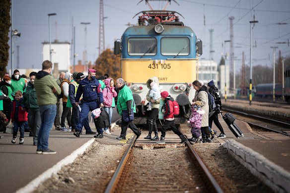 Refugees arrive at the Hungarian border town of Zahony on a train that has come from Ukraine on March 03, 2022 in Zahony, Hungary. Over one million refugees from Ukraine have now fled into neighbouring countries such as Hungary.