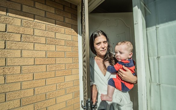Next door neighbour Briana Zaffina worries about the safety of her family, including 7 month old son Remi.