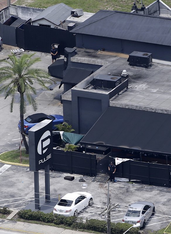 Law enforcement officials work at the Pulse nightclub.