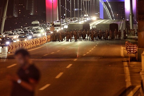 Turkish soldiers block Istanbul's Bosphorus Brigde. Istanbul's bridges across the Bosphorus, the strait separating the European and Asian sides of the city, have been closed to traffic.