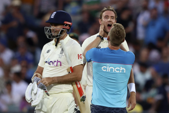 Broad receives medical attention after being hit on the chin by Jhye Richardson while batting. 