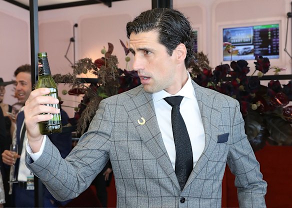 Andy Lee poses at the Myer Marquee on Derby Day